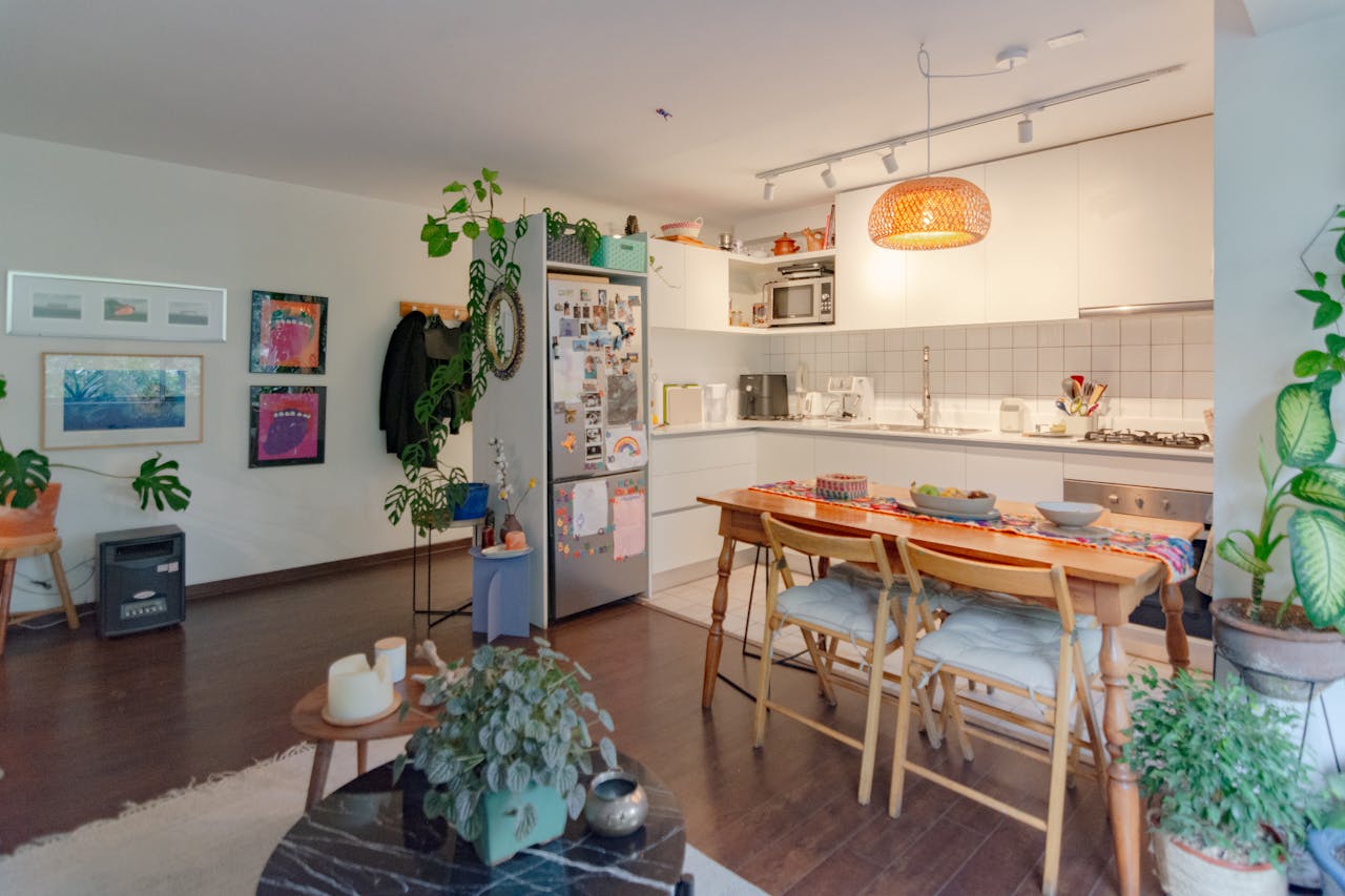 hero-img-01 A stylish kitchen and dining area with contemporary design and abundant natural light.